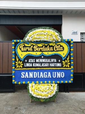 Papan Bunga Duka di Deket